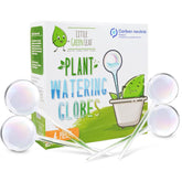 Little Green Leaf watering globes with clear glass bulbs on a plant for easy indoor hydration