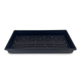 Living Whole Foods plant trays with drain holes ideal for seed starting and hydroponic setups.