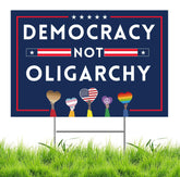 Lnyelxa Democracy Not Oligarchy yard sign front view in blue, showing bold message.