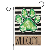 Louise Maelys flag with dog paw and clover welcomes guests outdoors.