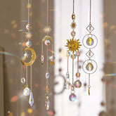 Louxiar crystal suncatcher in windows casting colorful light into the room.