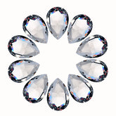LoveUnited teardrop crystal pendant hanging in a window to create rainbow light