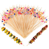 LOYIM 8-inch bamboo cocktail picks with gold pearl finish for elegant appetizers.