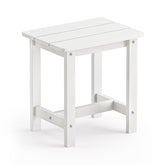 LUE BONA outdoor side table with weather-resistant white finish beside a chair on a patio.