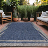 Luul Home bordered outdoor rug 6x9 navy adds style to patio and porch