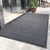 LVETOLS Moisture Guard Doormat at the front door with stripe pattern and durable protection.