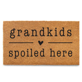 MAINEVENT Grandkids Spoiled Here doormat at entry, welcoming visitors with a playful message.