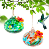 MARCHROSE two-piece blown glass hummingbird feeder offers outdoor viewing from windows.
