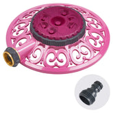 Melnor Sprout 8-pattern sprinkler in Raspberry Red waters irregular beds precisely.