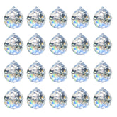 MerryNine crystal prism suncatcher in sunlight casting colorful rainbows in a window.