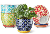 Metahom ceramic pot with colorful geometric pattern brightens any space.