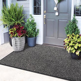 Mibao dirt-trapper front door mat catching mud at the entry