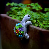 Mini Turtle Statue climbing turtle ornament adds playful charm to outdoor gardens and pots.