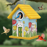 MINWOLF wooden bird house with yellow exterior in outdoor garden
