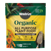 Miracle-Gro Organic All Purpose Plant Food granules on soil to feed outdoor plants