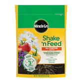Miracle-Gro Shake 'N Feed container front for long-lasting indoor plant nourishment.