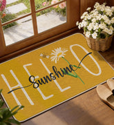 Miss Adola Hello Sunshine door mat welcomes guests at the front entrance with daisies.