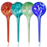 Mission Gallery glass watering globe for indoor and outdoor plants maintains steady moisture.