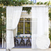 MIULEE outdoor curtain waterproof porch panel provides privacy and coverage in a breezy setting.