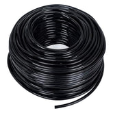 MIXC quarter-inch black distribution tubing for drip irrigation in a garden