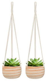 Mkono ceramic hanging planter with macrame hanger for stylish indoor display.