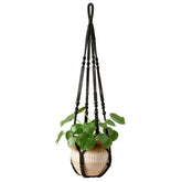 Mkono macrame plant hanger with wood beads adds natural texture for indoor greenery