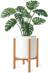 Mkono mid-century wood plant stand displays a 10-inch planter for elevated greenery.
