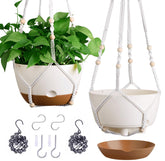 Montresor self-watering hanging pot with removable saucer for effortless plant care.
