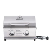 Monument Grills tabletop grill with travel locks for secure transport.