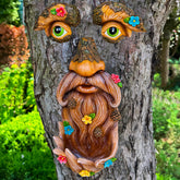 Mood Lab Tree Face Decor old man bird feeder adds playful outdoor charm.