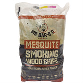 Mr. Bar-B-Q Mesquite smoking chips in a bag for rich backyard flavor.