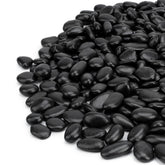 Mr. Fireglass Black Polished Pebbles 3/8-inch aquarium rocks illuminate underwater displays.