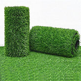 MYOYAY artificial grass turf rug rolled out over a 109 sq ft area for a lush outdoor lawn