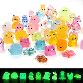 Naler glow resin ducks brighten a fairy garden at dusk for charming scenes
