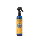 Nantucket Spider insect repellent 8oz bottle pouring to cover skin and clothing.