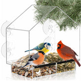 Nature's Hangout window bird feeder with strong suction cups on glass for secure viewing
