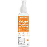 NatureStop chigger repellent spray bottle for outdoor protection.
