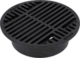 NDS 8-Inch Round Drain Grate over 6-Inch pipe, blocking debris while draining water
