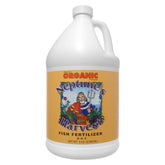 Neptune's Harvest bottle pour for garden use, showing application.