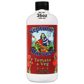 Neptune's Harvest tomato-vegetable fertilizer bottle poured to boost foliage and root health.