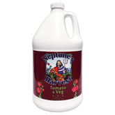 Neptune's Harvest tomato and vegetable fertilizer bottle pour supports vigorous growth.