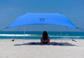 Neso portable beach tent setup provides quick shade for families.