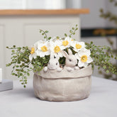 Newman House Studio Spring Bunny Flower Pot adds charm to outdoor gardens with a cute rabbit motif.