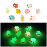 NIBERDA 45-pcs mini cow figurines glow in the dark for enchanting gardens.