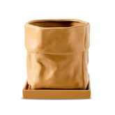 Nihow ceramic bag-shaped pot with terracotta finish for stylish indoor displays