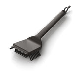 Ninja XSKBRUSHXL brush close-up showing sturdy bristles for thorough grill cleaning.