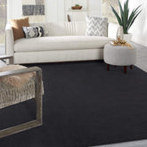 Nourison Essentials Black 8x10 rug with indoor-outdoor versatility for busy spaces.