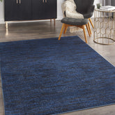 Nourison Essentials Midnight Blue 6' x 9' rug close-up shows color and soft texture