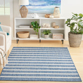 Nourison Positano navy ivory rug with stripes enhances outdoor patio decor.