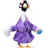 OBUSATT Lady Porch Goose outfit in purple bathrobe adds playful curb appeal to outdoor decor.